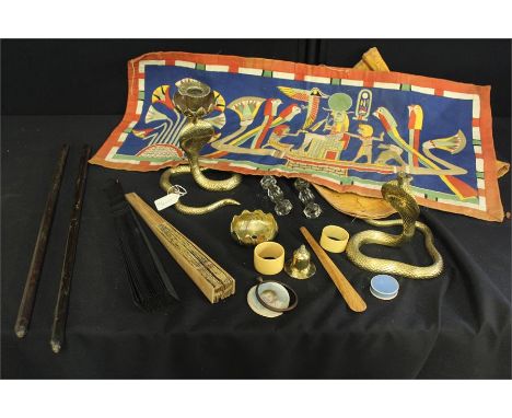 Works of art, to include a pair of Indian Cobra snake candlesticks, two textiles pieces from Egypt, two fans, napkin rings, a