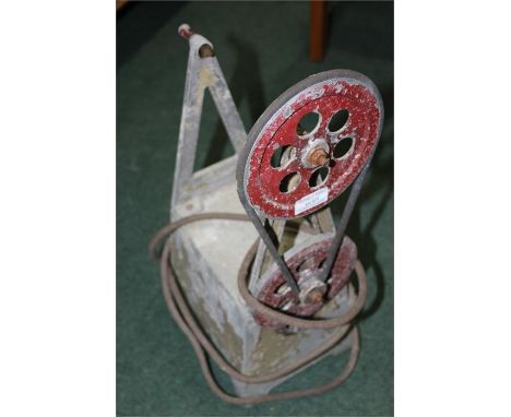Rowlway vintage electric butter churn, together with a cast iron fire basket, (2)