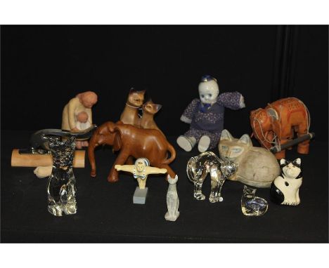 Collection of cats, to include glass examples, wood and pottery, together with a hardwood elephant, an elephant puppet, etc, 