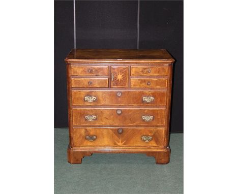 Reproduction walnut and marquetry inlaid media unit, in the form of a 17th century chest, with up and under false drawer fron