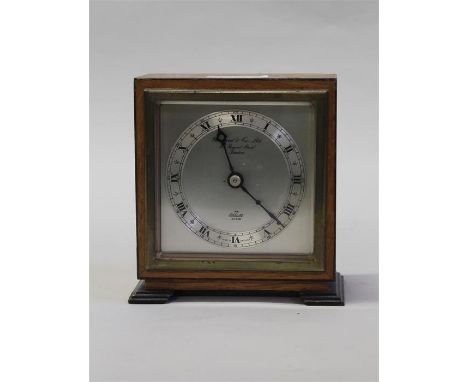 Small mantel clock by Elliot for Garrard & Co, Regents Street, silvered dial with Roman numerals