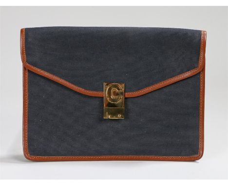 Celine Paris canvas clutch bag, with a gilt metal C clasp, named to the interior Celine Paris