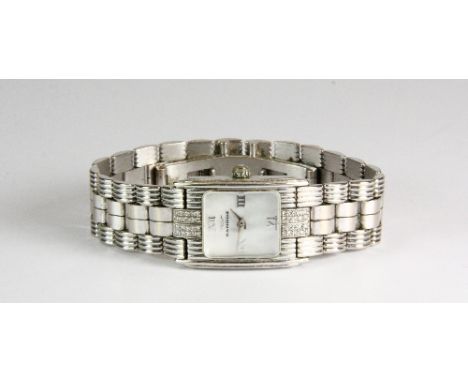 An 18ct white gold ladies Sandoz wristwatch with mother of pearl dial and diamond set body