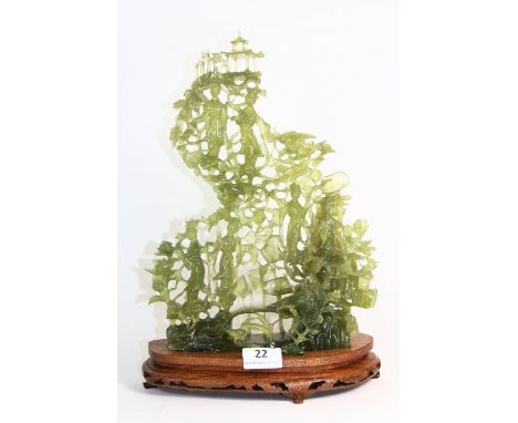 An intricately carved mid 20th century Chinese jade figure of Tang ladies on a metal inlaid carved hardwood stand, (H 37cm ov