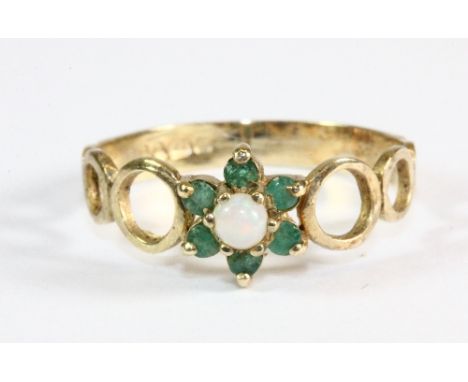 A 9ct gold opal and emerald ring (O)