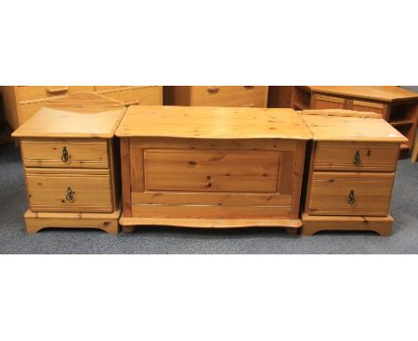 A pair of pine bedside cabinets and a trunk style hifi cabinet