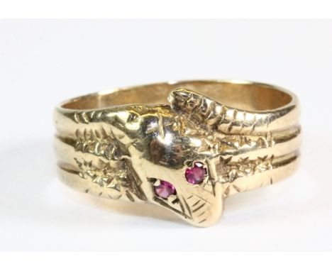 A 9ct gold snake ring with ruby eyes (U)