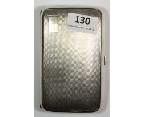 An engine turned hallmarked silver cigar case circa 1952