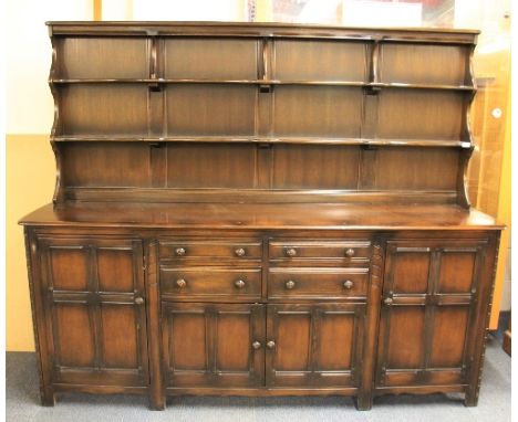 A large Ercol oak dresser, W 213cm, H 176cm