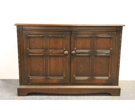 An Ercol oak hifi cabinet