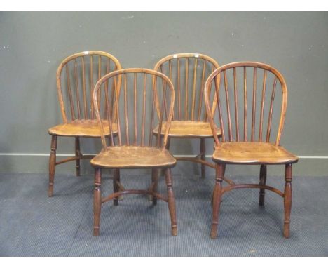 Four matched early 19th century stick back chairs with crinoline stretcher