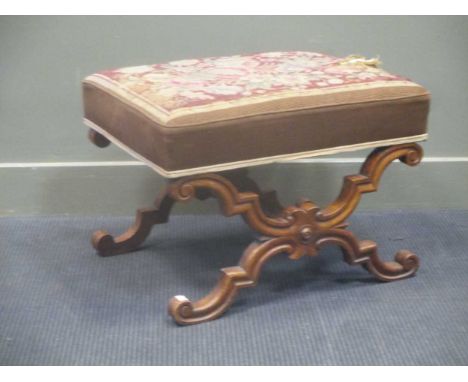A Victorian walnut X framed stool with a later upholstered tapestry top 45 x 63 x 50cm