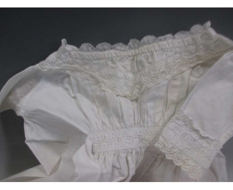 A box of Victorian and Edwardian cotton or linen robes and clothes, including a fine blouse with foliate details