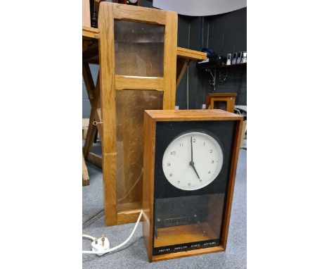 Smtihs English Clock Systems mahogany cased electric pendulum wall clock, 41cm, and a light oak square dial clock case, 74cm
