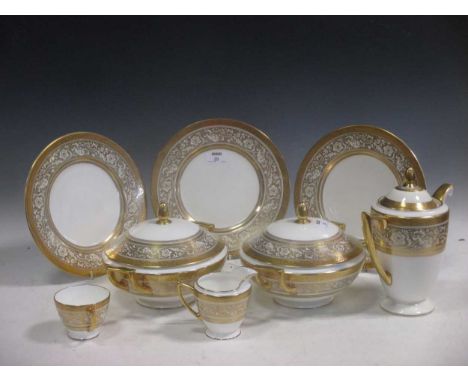 A Minton 'Porcelain Ball' pattern dinner, tea and coffee service for six, comprising, dinner plates (one broken), soup bowls,