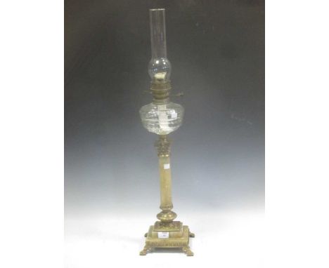 A brass mounted onyx column oil lamp 86cm high total