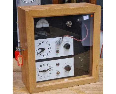 Synchronome two dial distributon panel, light oak case, probably 1950s-60s