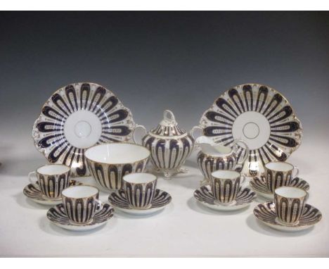 An early 19th century English part tea and coffee service with blue and gilt decoration to include ten coffee cups, ten tea c