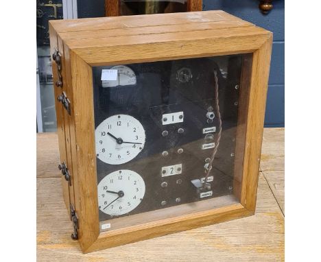 Synchronome two dial distributon panel, light oak case, probably 1940s