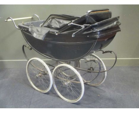 A 20th century coach build pram, together with a compactum trunkJuilians Park