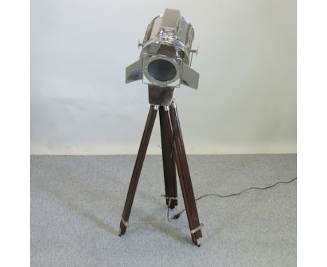 A standard lamp, in the form of a stage light, on a tripod base, 130cm tall