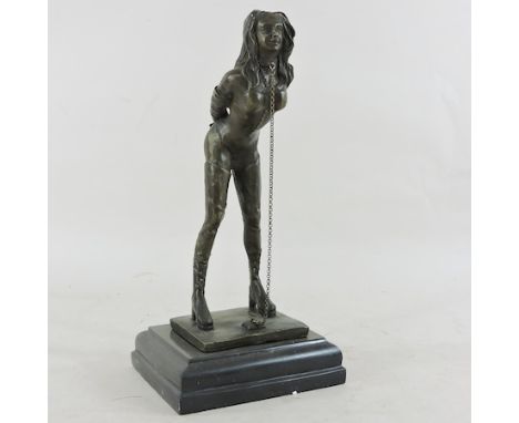 A bronze figure of a lady in chains, 31cm tall 