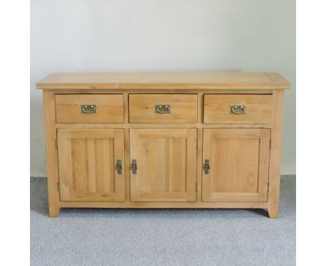 A modern light oak sideboard, 149cm