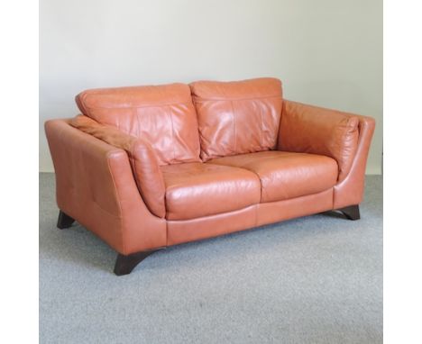 A modern tan leather upholstered sofa, 180cm