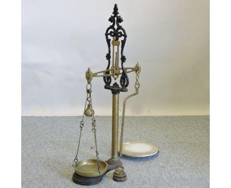 A set of 19th century brass and iron balance scales, 96cm tall