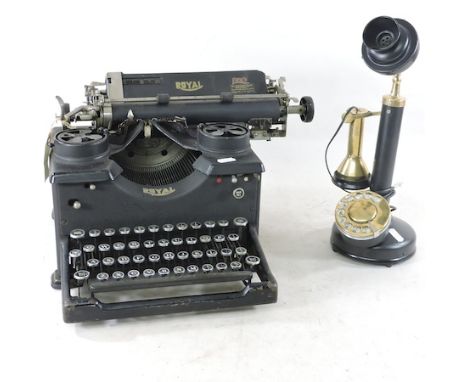 A Royal 12 typewriter, together with a stick telephone, 36cm tall