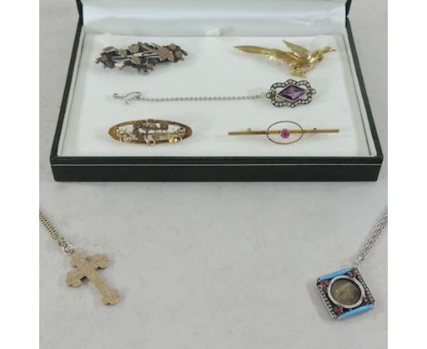 A 9 carat gold cross pendant on a chain, a pearl and amethyst silver brooch and an enamel and seed pearl mourning pendant ins