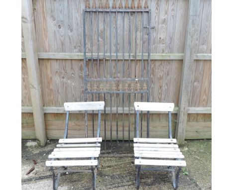 A Victorian iron gate, 79cm wide, together with two garden chairs 