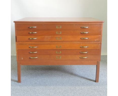 A 20th century plan chest, containing six long drawers, together with a large collection of ordnance survey maps, 122cm