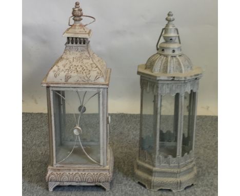 A cream painted lantern, 68cm tall, together with another similar