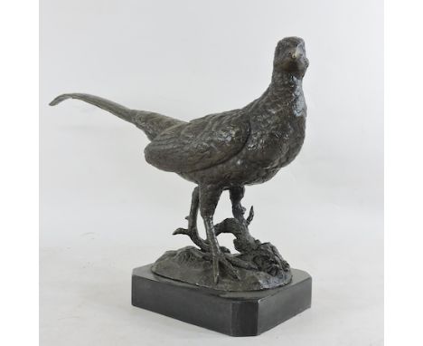 A bronze model of a pheasant, on a marble base, 33cm tall