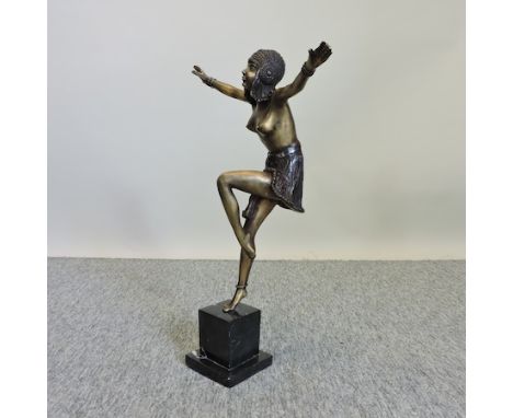 An Art Deco style bronze figure of a young lady, on a marble effect base, 48cm tall