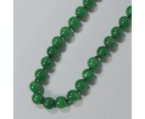 A jade bead necklace 