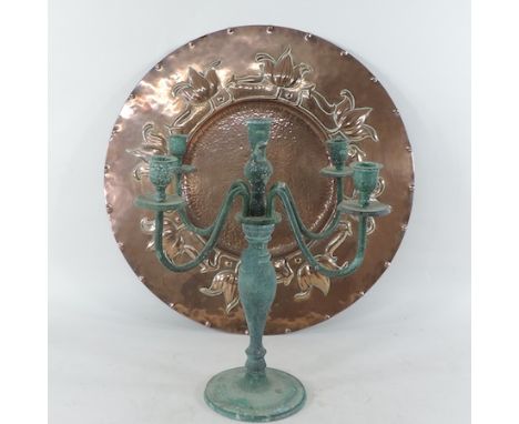 A Newlyn style copper tray, 46cm diameter, together with a verdigris five branch candelabra