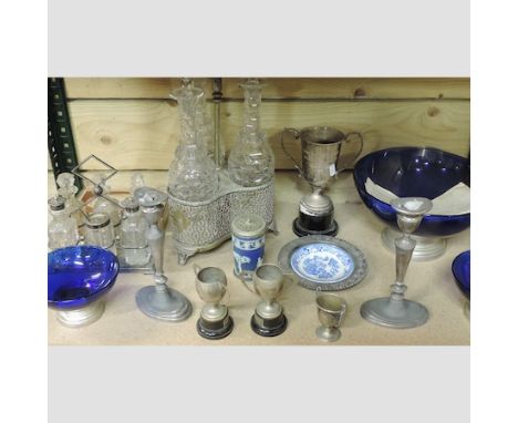 A collection of various glassware, to include a decanter set, blue glass bowl and silver plated items, newspaper cuttings and