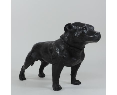 A bronze model of a Staffordshire bull terrier, 20cm tall