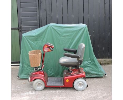 A Shoprider Deluxe mobility scooter, 114cm, with rain cover and portable shelter  