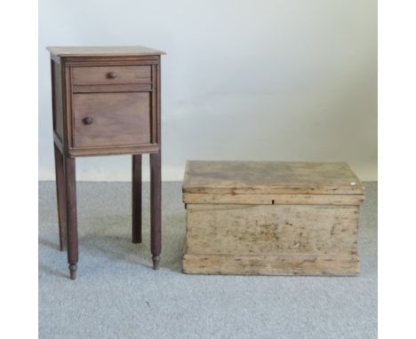 An early 20th century French fruitwood pot cupboard, together with a pine trunk, 66cm