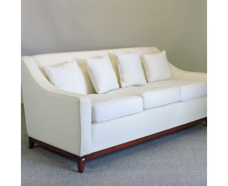 A Parker and Farr London white upholstered three seater sofa, 210cm