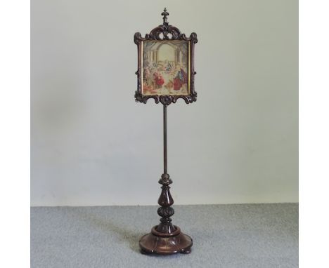 A Victorian rosewood and tapestry pole screen, 136cm