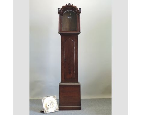 An 18th century oak cased longcase clock, 220cm tall, with an associated brass dial