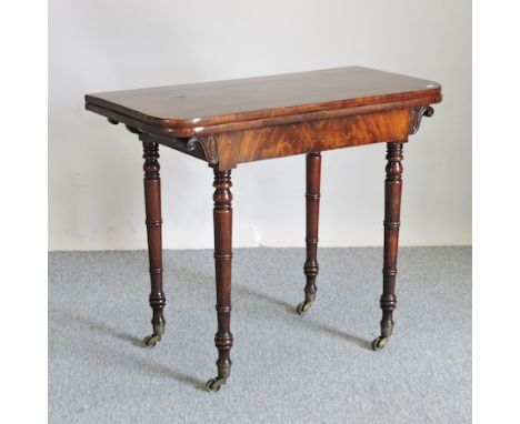 A Regency mahogany D shaped folding card table, on ring turned legs, 91cm