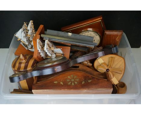 A box of mixed collectables to include wooden bookends, treen and a barometer. 