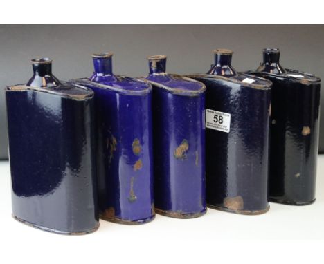 A set of five vintage blue metal enamel Flasks. 