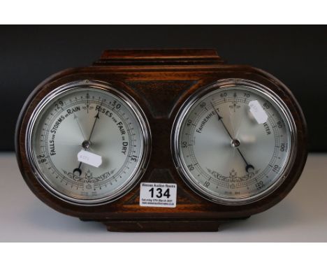 A mid 20th century oak cased Barometer and Thermometer. 