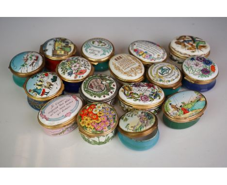 A collection of sixteen enamel patch boxes by Halcyon Days 